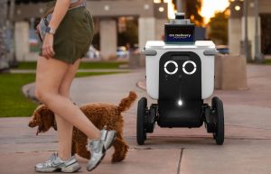 AI delivery robot on the street delivering food autonomously